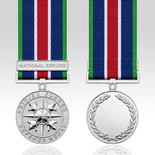Front and back views of a British Forces Defence Medal with a 'National Service' ribbon, shown on a light gray reflective background.