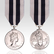 Full-size Queen's Police Medal QPM replica featuring the Queen Elizabeth II design and distinguished service medal ribbon.