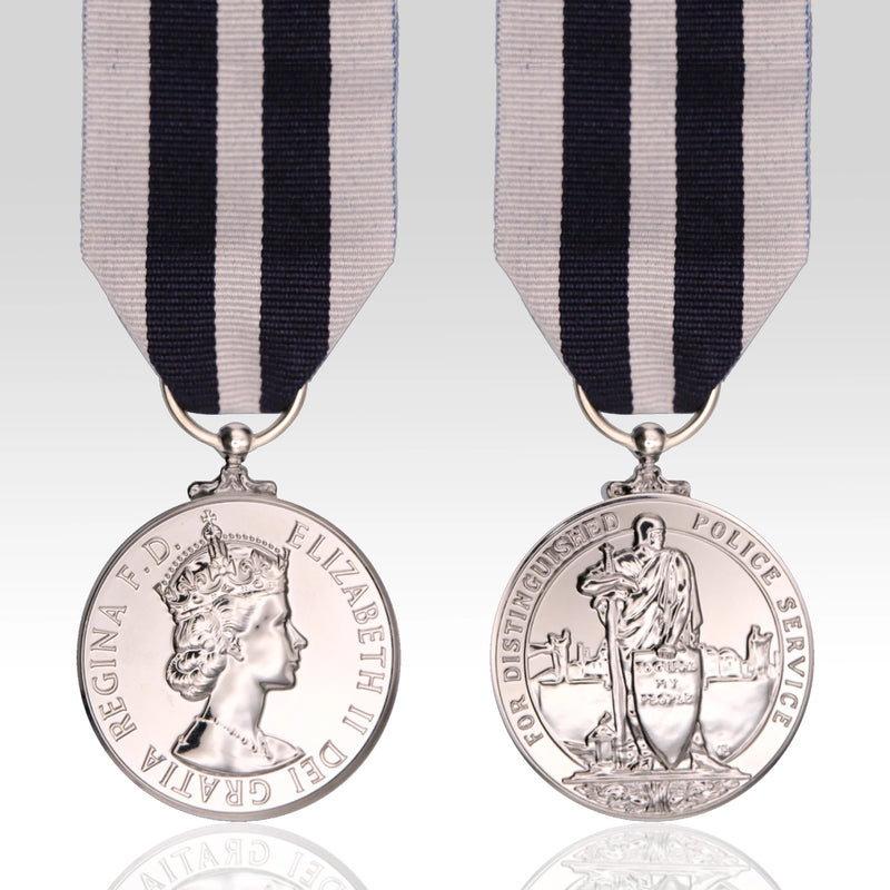 Full-size Queen's Police Medal QPM replica featuring the Queen Elizabeth II design and distinguished service medal ribbon.